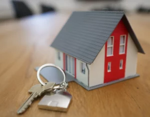 bl3 (1) - VA Construction Loan - VA Construction Loan Miniature home with keys at table